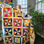 This beautiful quilt was donated by the Clinton Quilters Club.